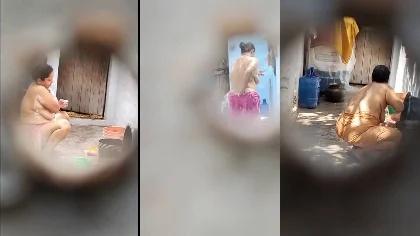 Desi Village Milf Bhabhi Bathing Her Home Inside Compound Peeping Neighbour By Side Wall Captured Part-2